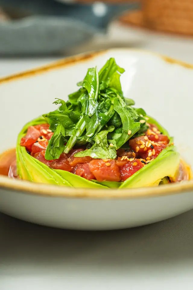 Tuna tartare wrapped in avocado with sesame